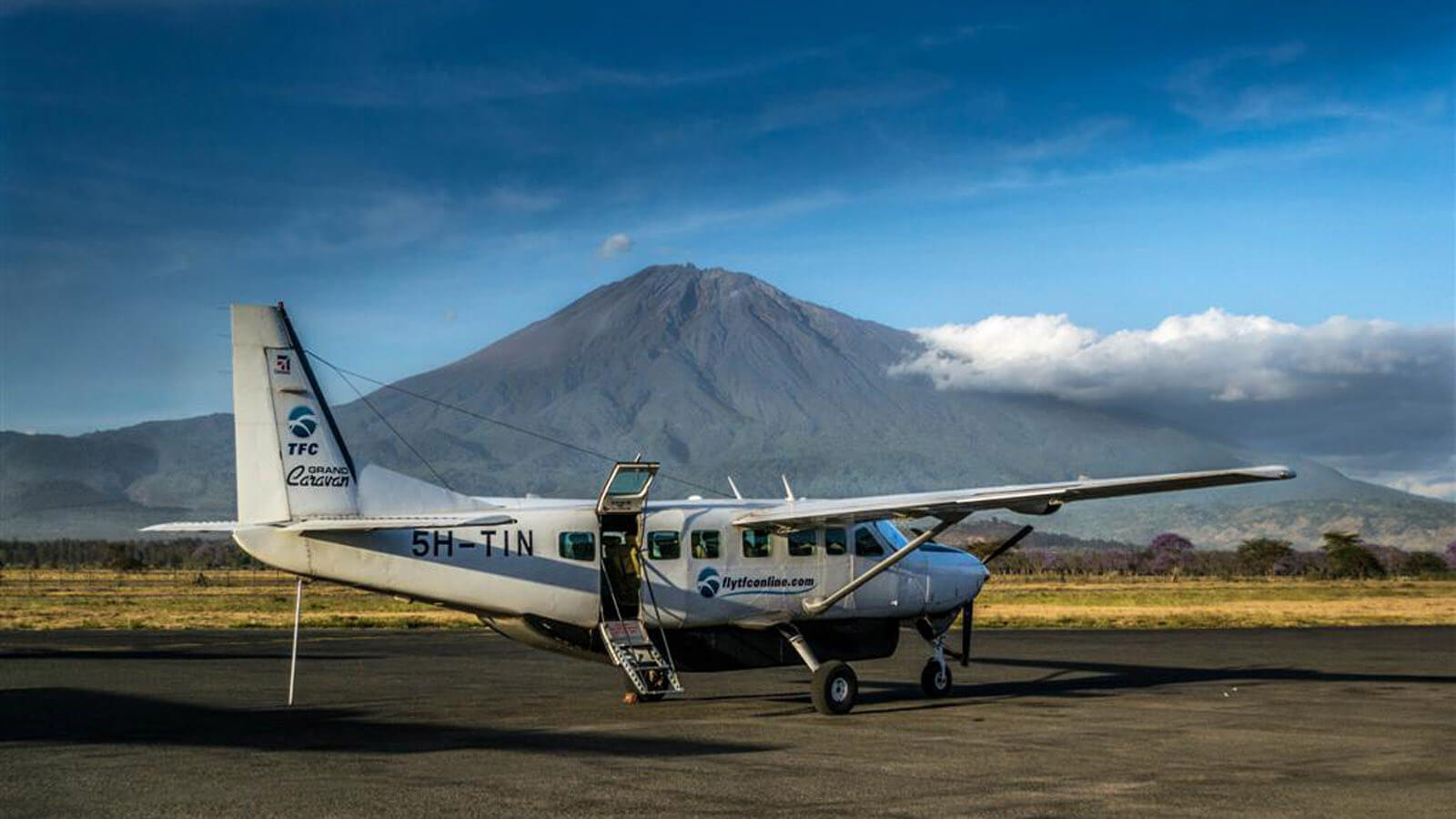 Cessna plane landing on Serengeti airstrip